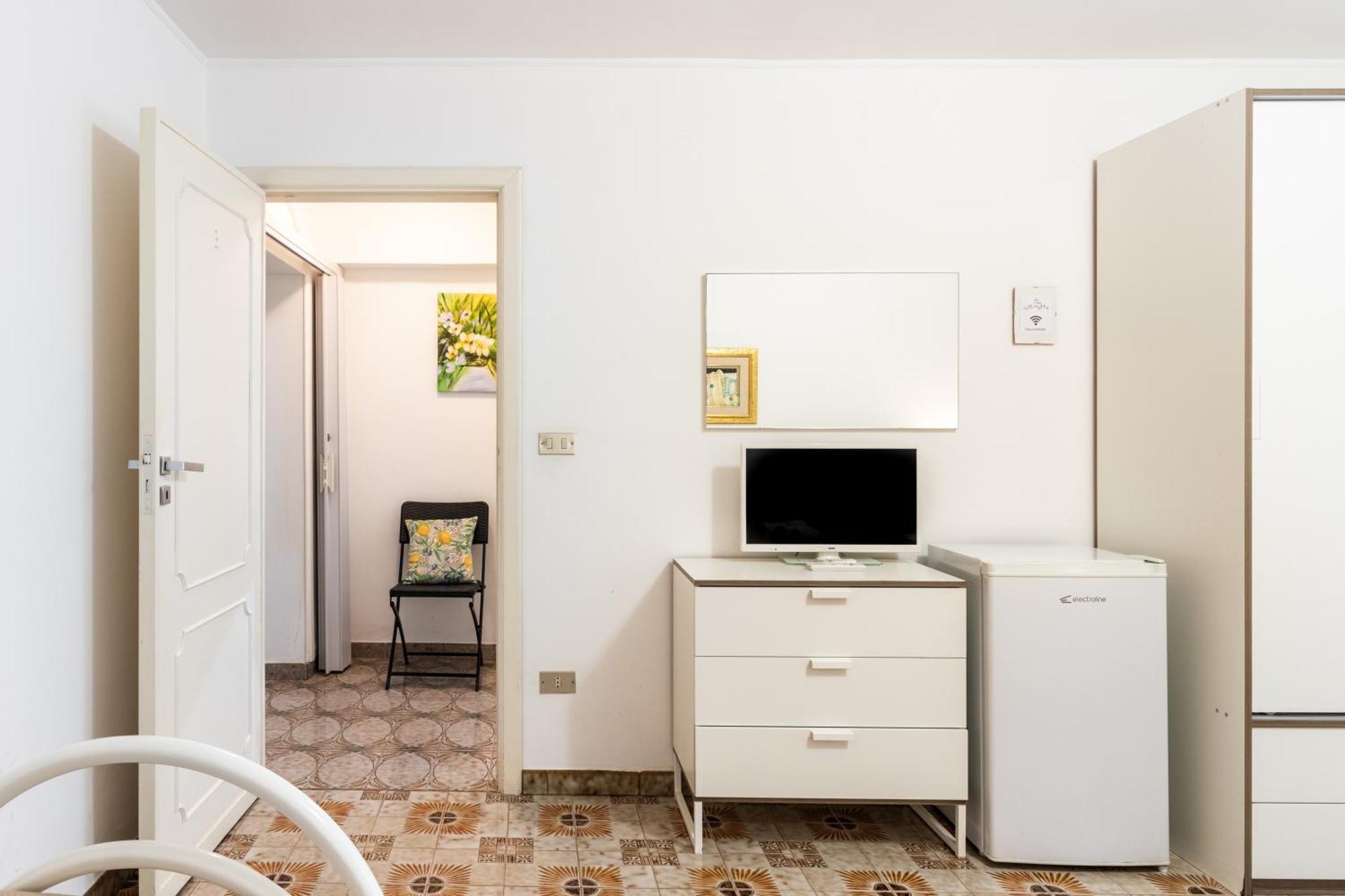Le Torrette Rooms And Apartments 阿沃拉 外观 照片