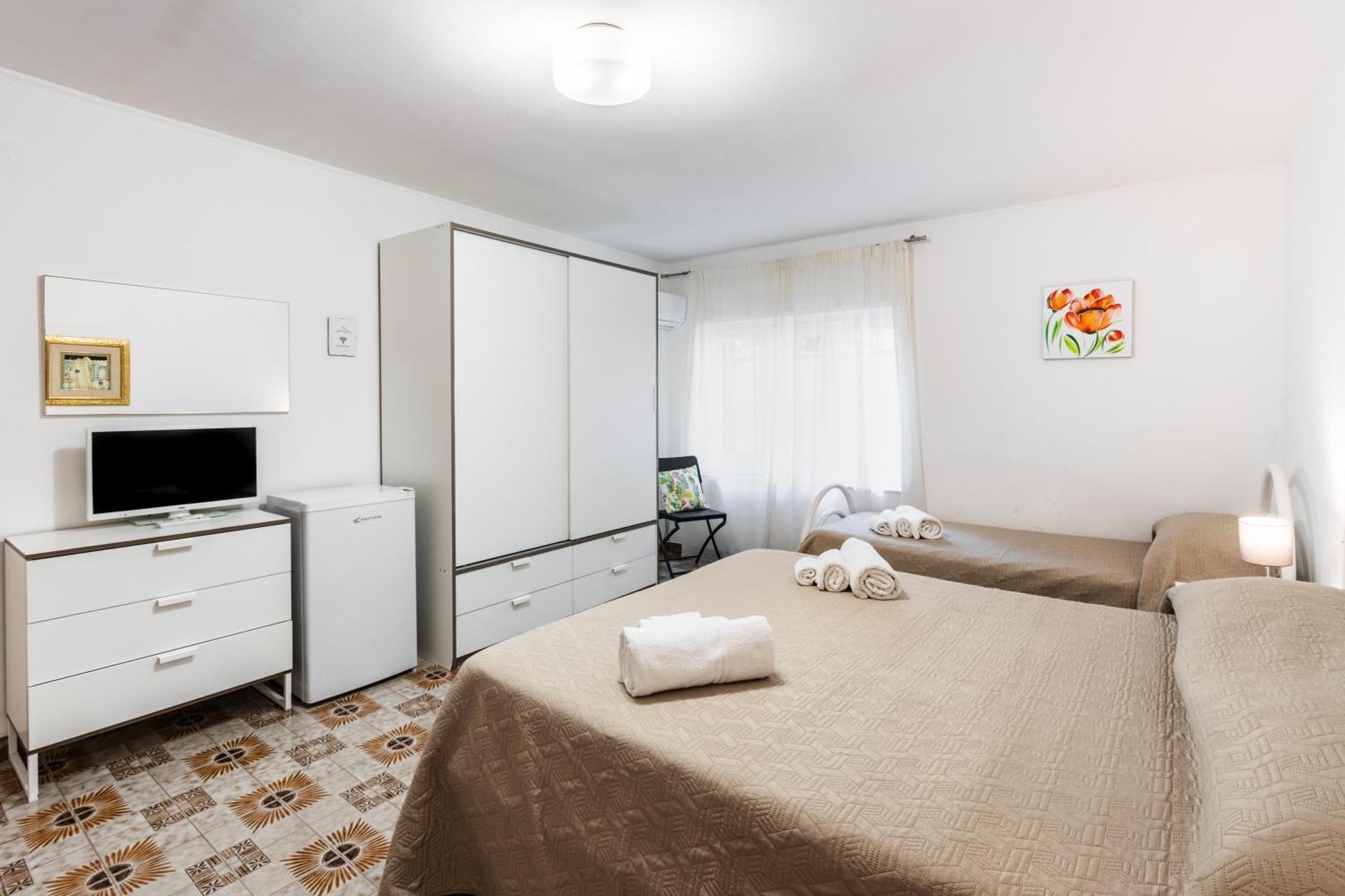 Le Torrette Rooms And Apartments 阿沃拉 外观 照片
