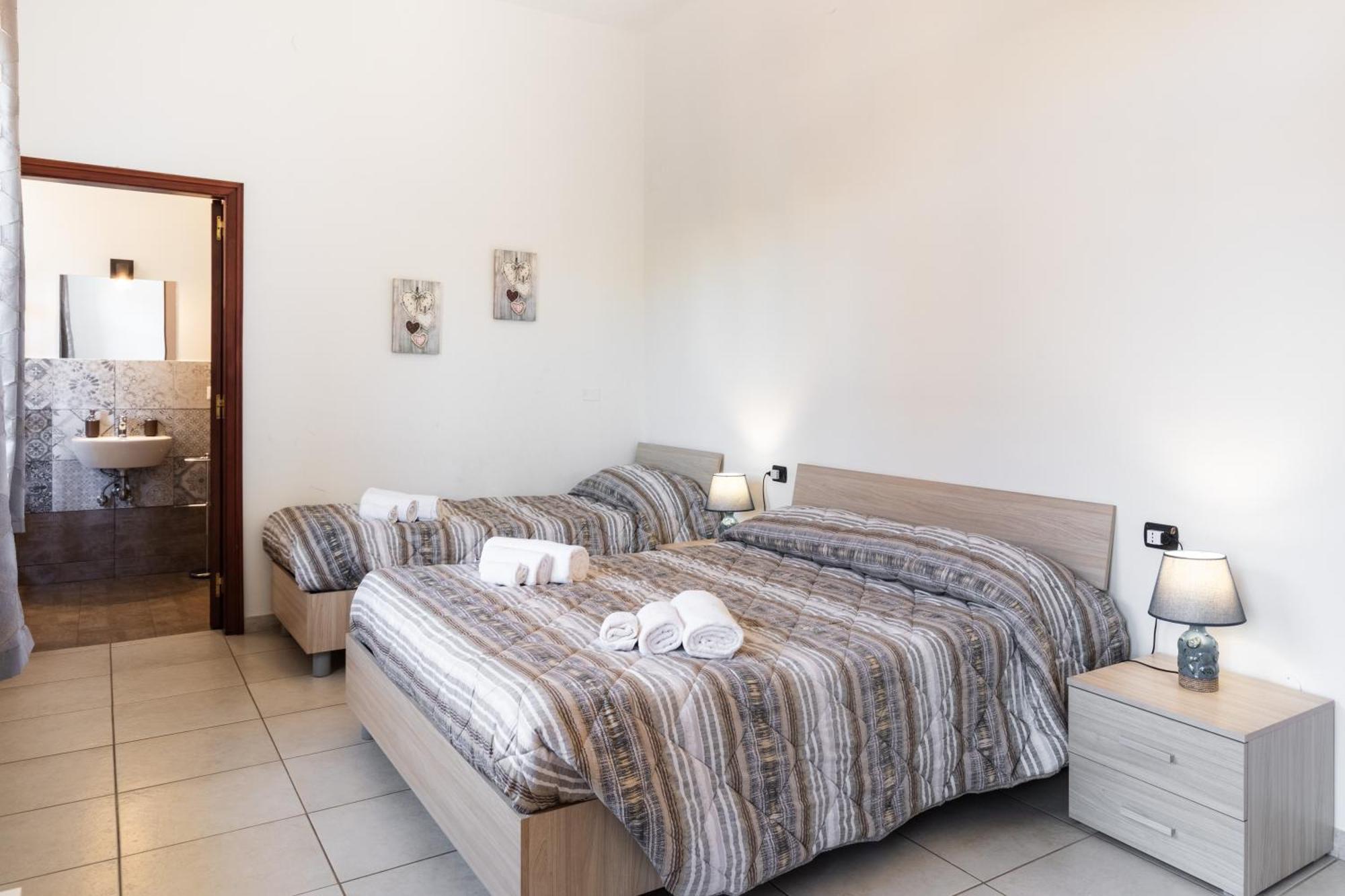 Le Torrette Rooms And Apartments 阿沃拉 外观 照片