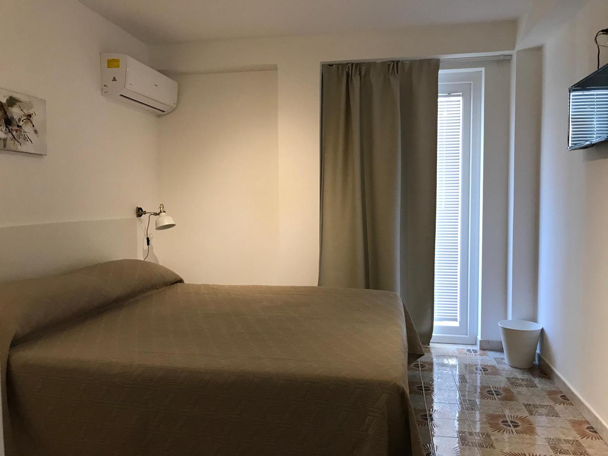 Le Torrette Rooms And Apartments 阿沃拉 外观 照片